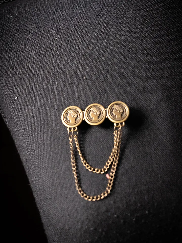 Broche roma