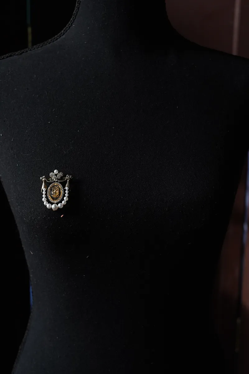 Broche reyna